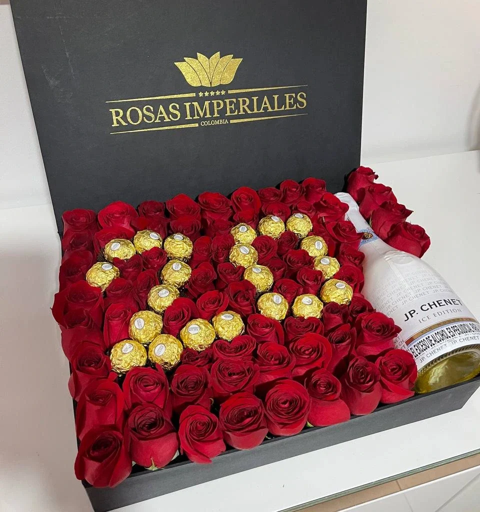 Caja plana grande con botella jp chenet y número formado por ferrero